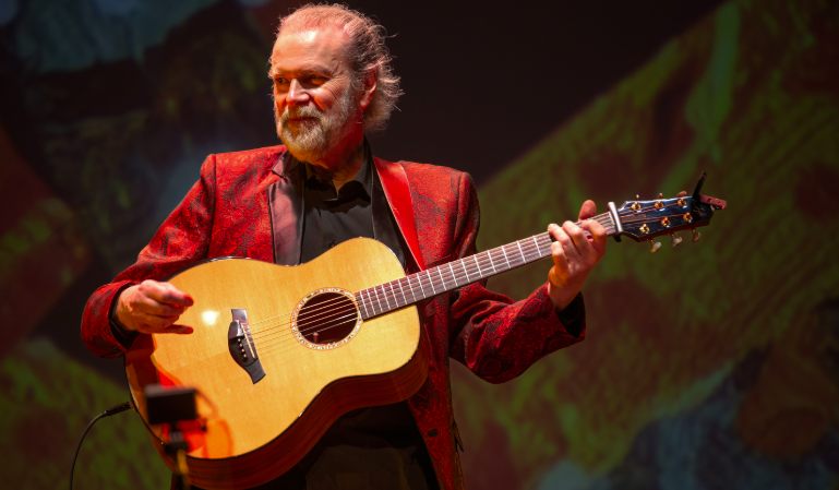 Beppe Gambetta performing on Acoustic Guitar at Alvas Showroom