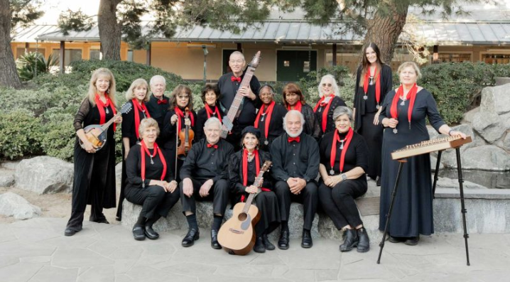 Group of musicians, philanthropists, and artists performing at the Grand Annex in San Pedro.